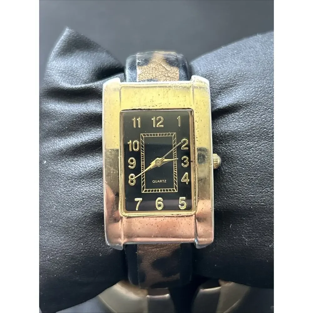 Gold Tone Cheetah Print Band Women’s Cuff Watch